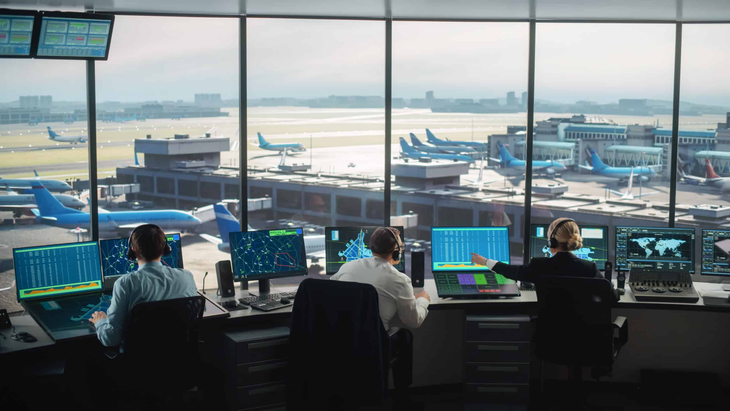 People sitting in a control room