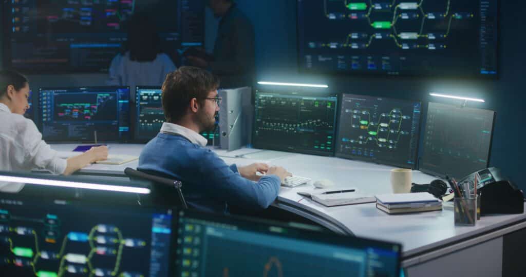 People sitting in a control center